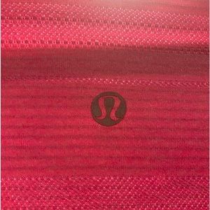 Pink Lululemon shirt.